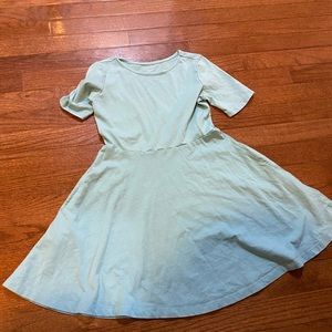 Delightful, dainty, dress in pool!